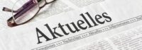 Zeitung mit der Überschrift Aktuelles